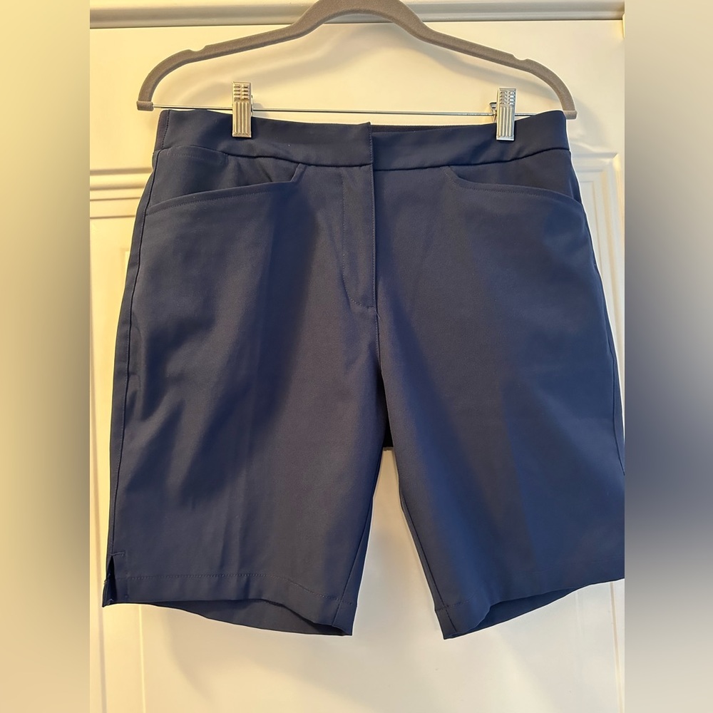Puma woman’s golf shorts, navy blue, size medium